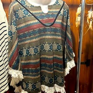 Earthbound company poncho styled top.